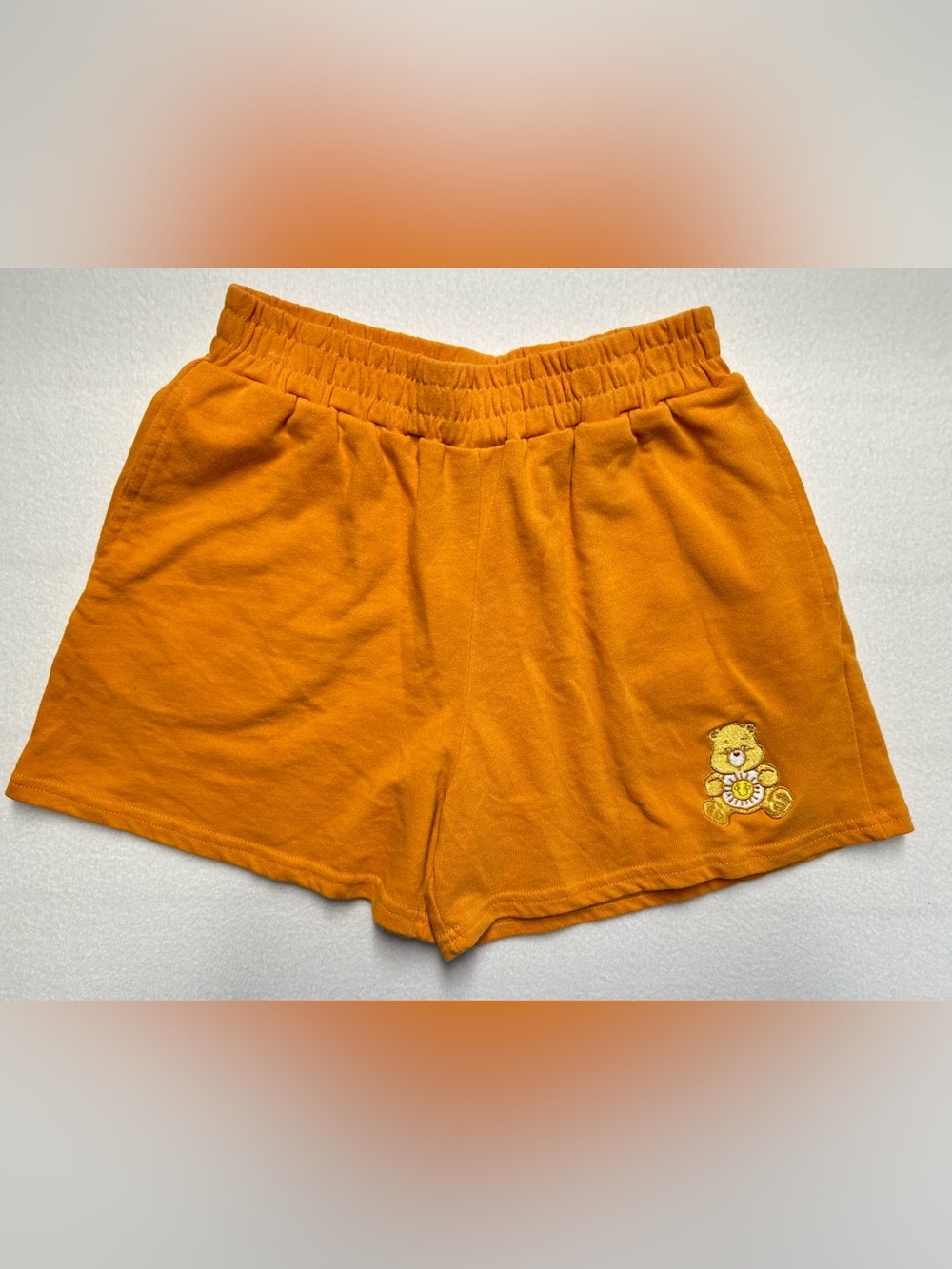 Care Bears Sunshine Bear Shorts Women’s Small • 3.5” Inseam Orange